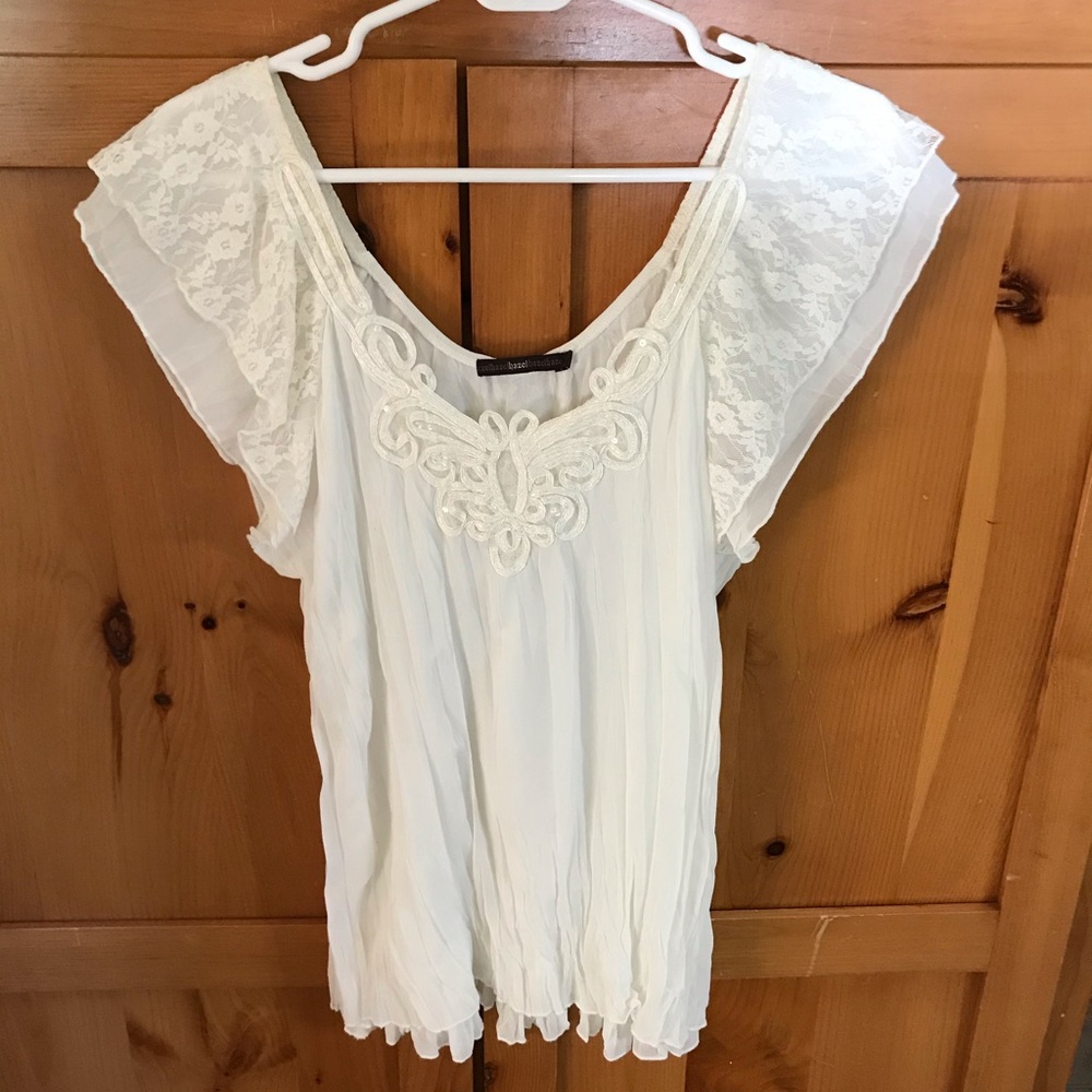 Creamy white top with lace, sequins